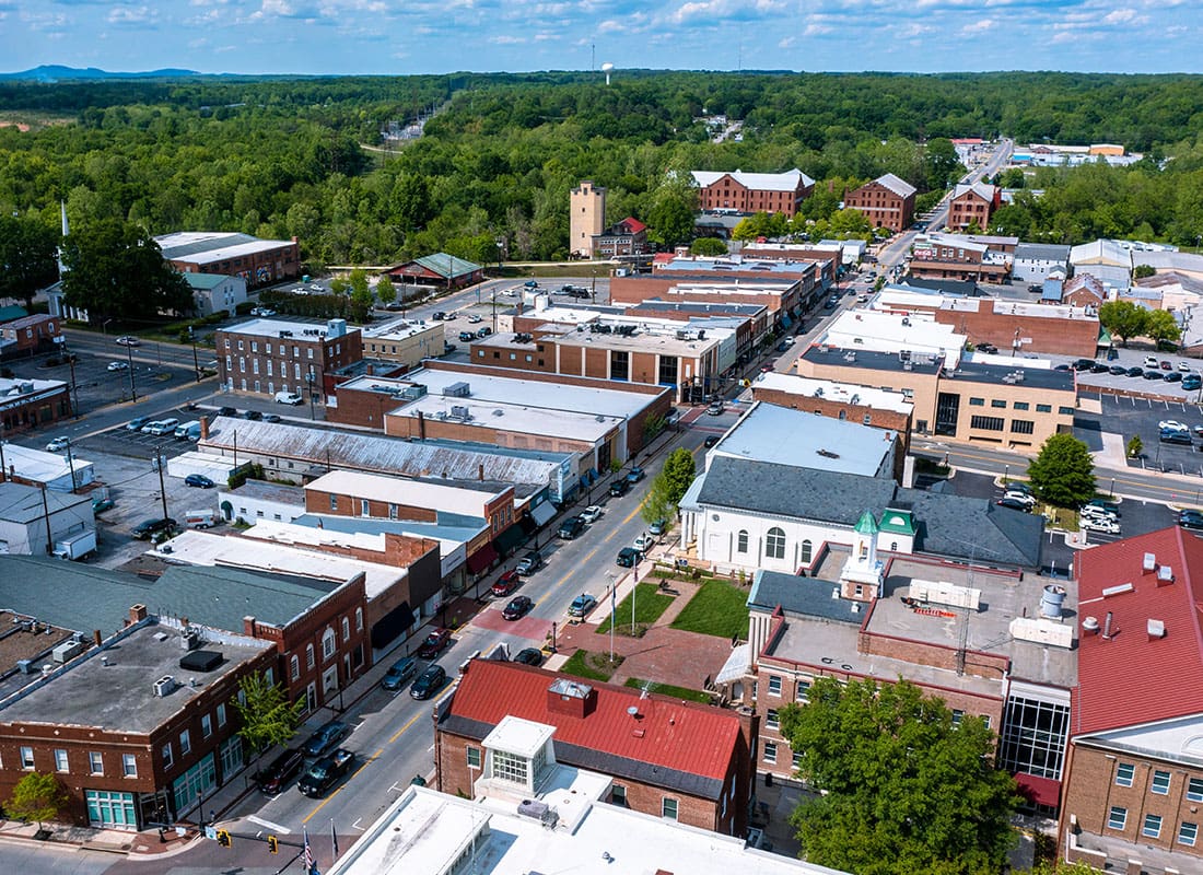 Farmville, VA - Aerial View of Buildings on Main Street in Farmville Virginia on a Sunny Day Looking North